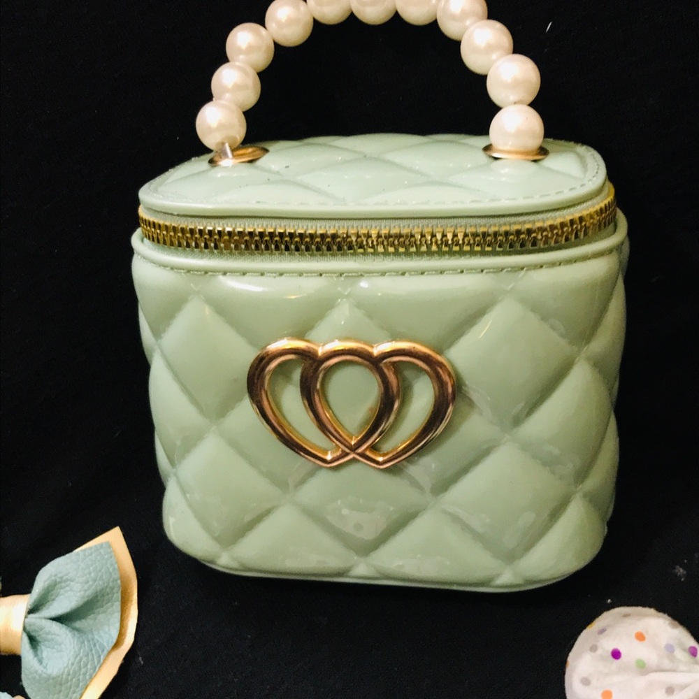 Green and Gold Quilted Purse with hair accessories and jewelry to match